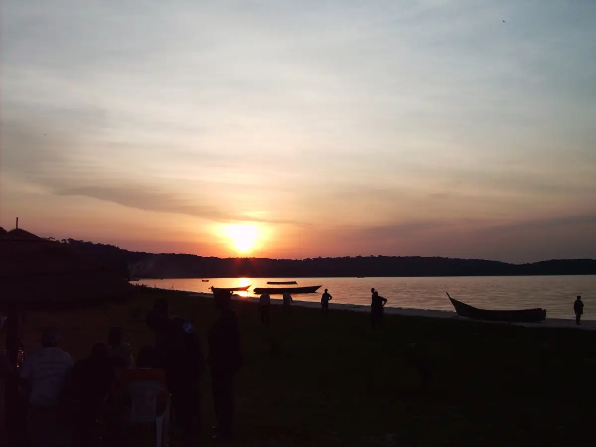 Sunset over the water at a beach in Kalangala